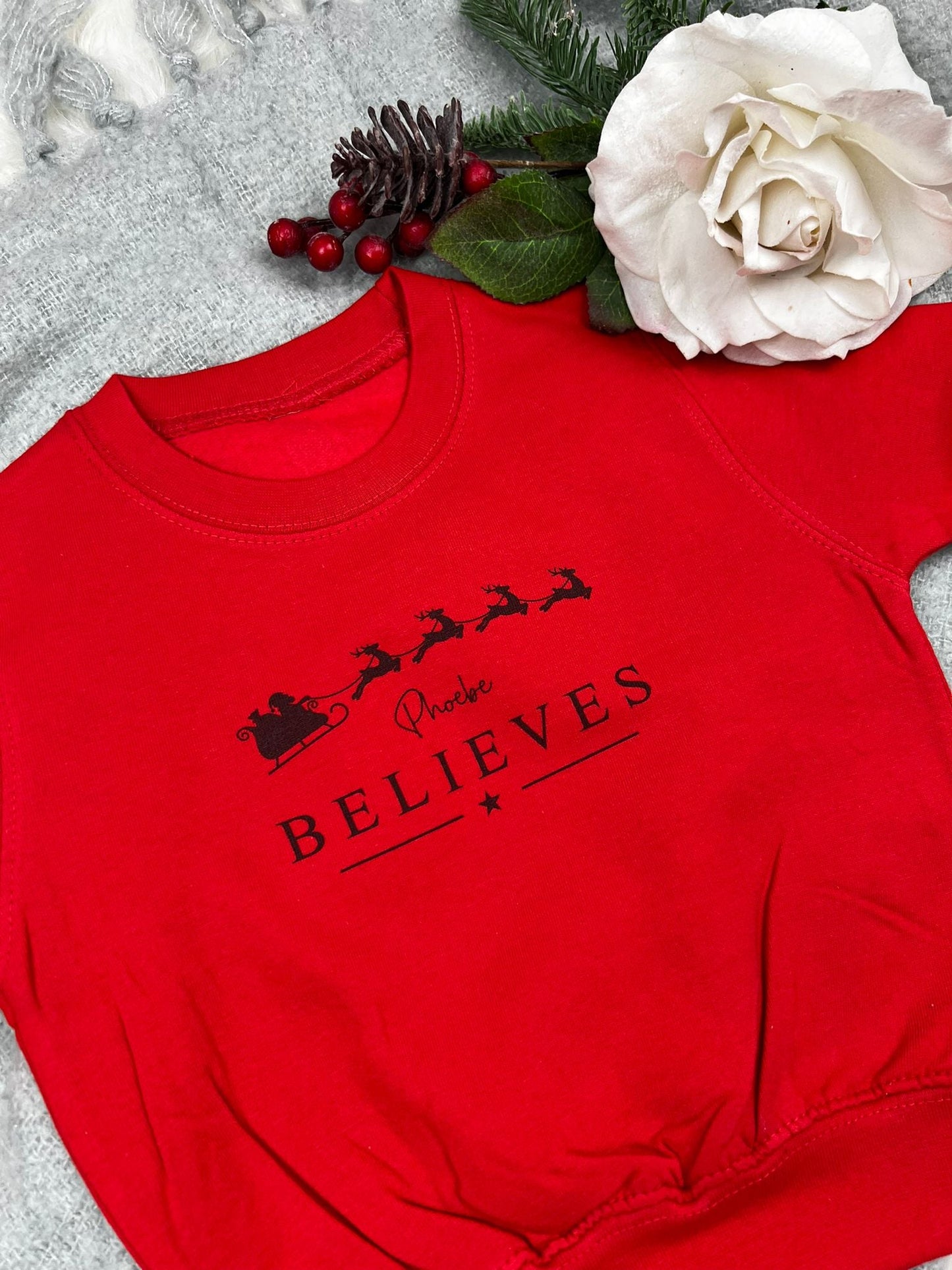 Children’s ‘Believes’ Personalised Christmas Jumper