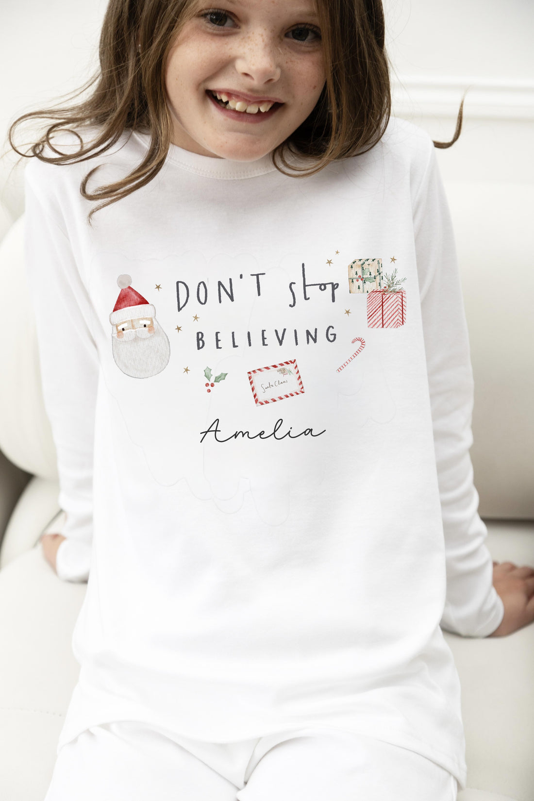 Personalised Plain White Christmas Pyjamas - don’t stop believing Design