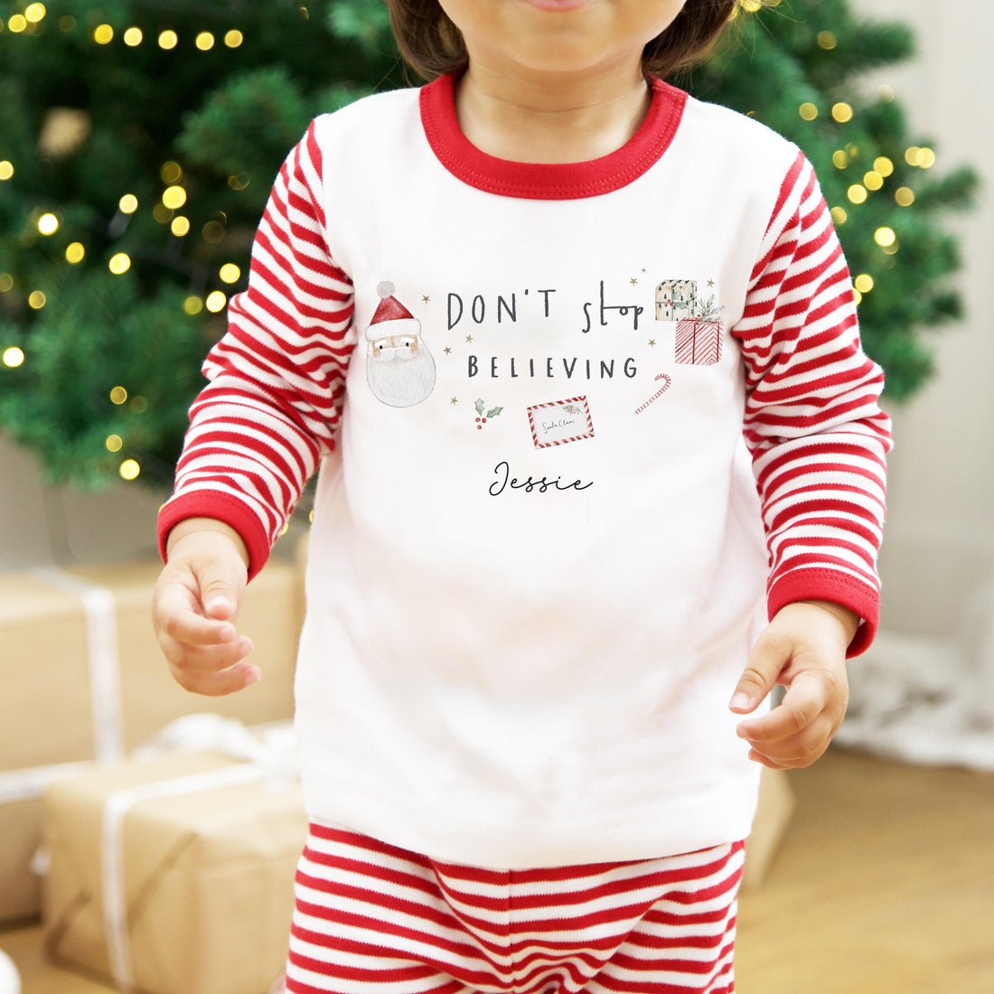 Personalised Red Stripe Christmas Pyjamas - Don’t stop believing Design